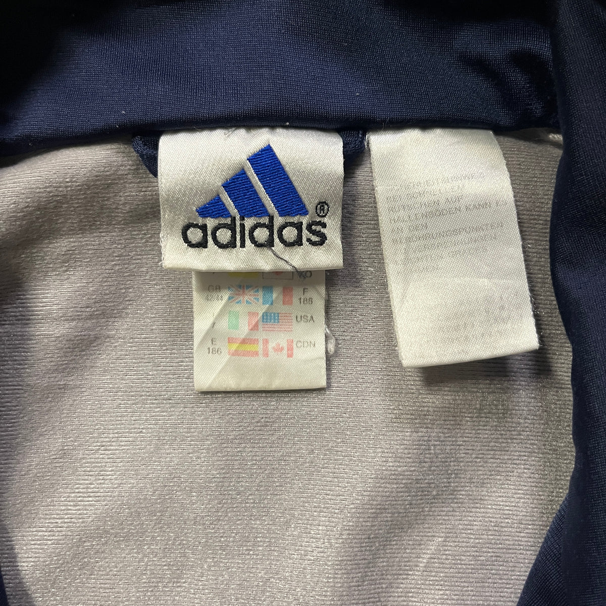 Vintage Adidas Jacke mit Reißverschluss / Rücken-Design (L)
