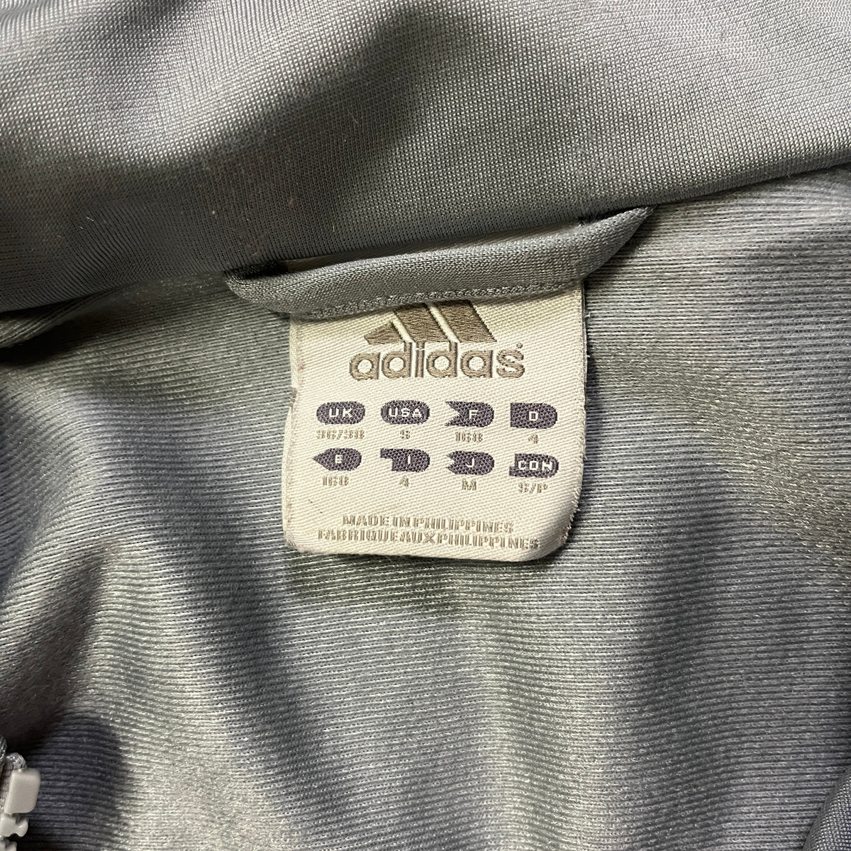 Vintage Adidas Jacke mit Reißverschluss / Rückendesign (S)