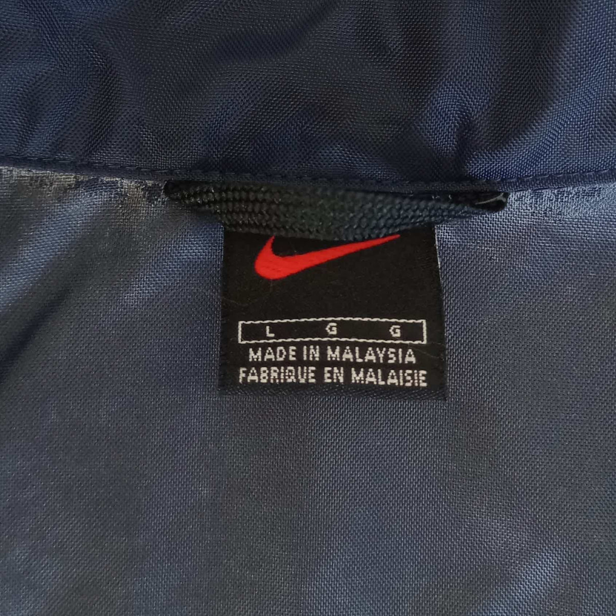 Veste de survêtement vintage Nike (Taille L)